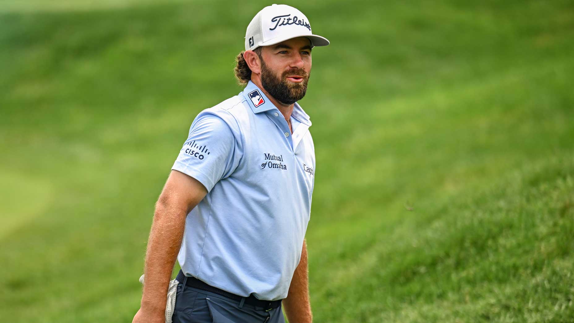 Cameron Young smiles at the Travelers Championship.
