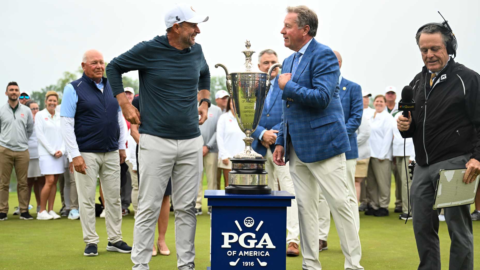 LIV pro Richard Bland is presented with 2024 Senior PGA Championship trophy